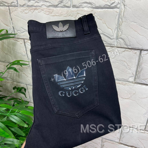 Джинсы Gucci 8369