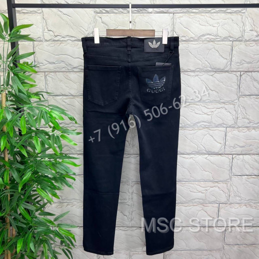 Джинсы Gucci 8369