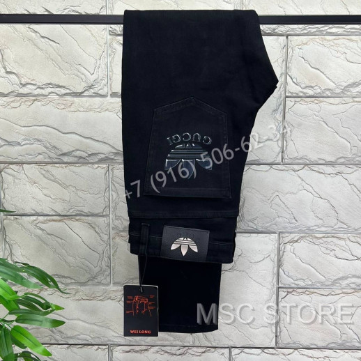 Джинсы Gucci 8369