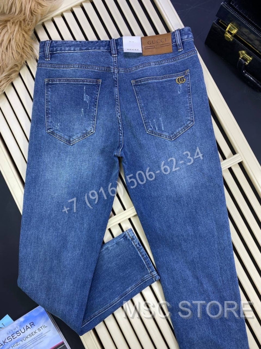Джинсы Gucci 8584