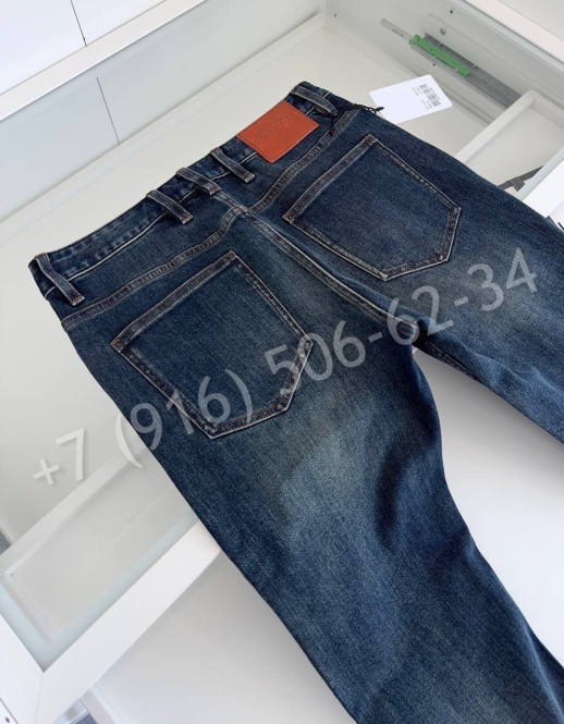 Джинсы Gucci 24919