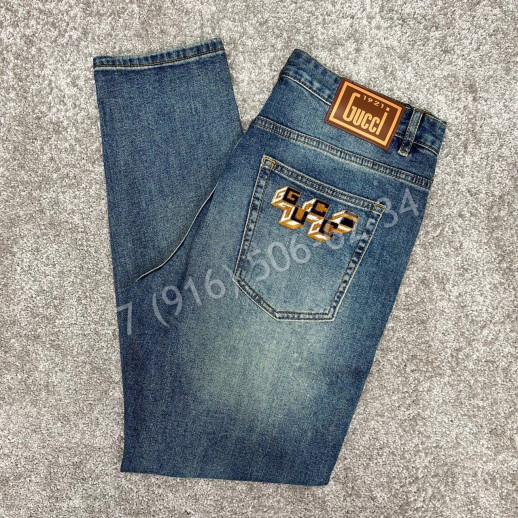 Джинсы Gucci 18477