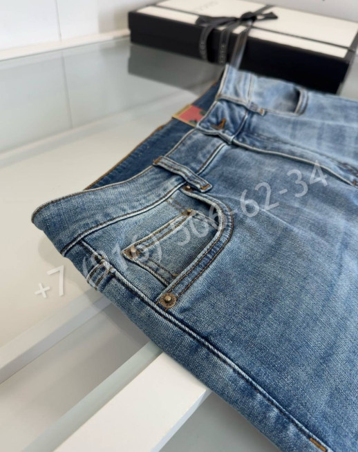 Джинсы Gucci 27465